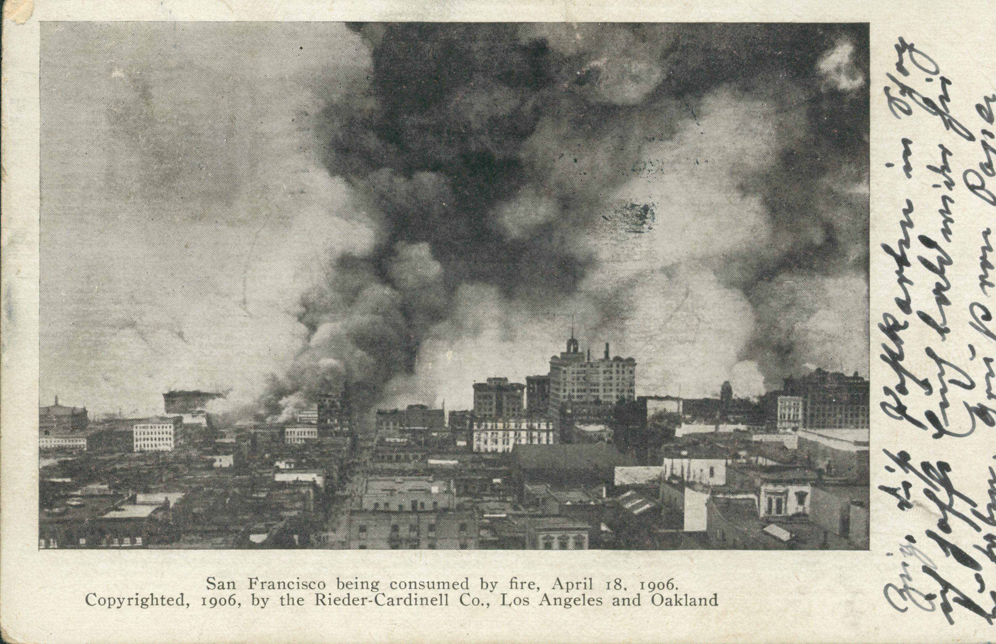 Shows a panoramic view of San Francisco on fire